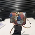 Chic multi-color patchwork small crossbody bag with textured leather and gold zipper - Patchwork