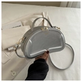 Silver quilted semi-circle shoulder bag with metallic finish and top handle detail - Silver