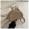 Beige quilted hobo bag with gold zippers and adjustable strap for shoulder or crossbody use - Khaki