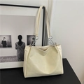 Minimalist beige tote bag with geometric stitching and elegant silver chain straps - White
