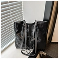 Bolso tote negro de textura agrietada con detalle de lazo y gran capacidad - Negro