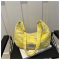 Detailed shot of yellow pleated shoulder bag with colorful wave embroidery and text label - Yellow Without Pendant