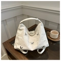 Sac à bandoulière blanc texturé avec rivets papillon argentés et design épuré - Sans Pendentif / Blanc