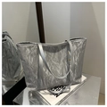 Detail of silver metallic tote bag with unique crinkled texture and sleek shoulder straps - No Pendant / Blue
