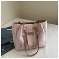 Detail of pink embroidered canvas tote with gold chain strap and leather patch - Pink