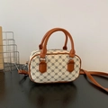 Bolso mini bowling crema con estampado de tréboles y asas de cuero sintético marrón - Beige