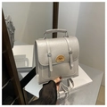 Detailed view of silver PU leather backpack featuring cute dog embroidery and silver buckles - No Pendant (No Pendant Silver)