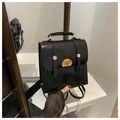 Detail view of black glossy patent leather backpack with cute dog embroidery patch - No Pendant (Black)