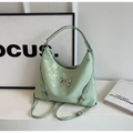 Mint green metallic hobo bag with silver bow accent and adjustable buckles - Green