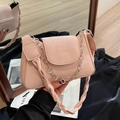 Pink faux leather shoulder bag with floral silver chain and twist crossbody strap - Pink