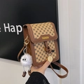 Brown leather vintage crossbody bag with khaki print and white plush monster charm - Brown with Pendant