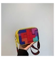Detail of colorful geometric patchwork crossbody bag with yellow PU leather and wide strap - Yellow