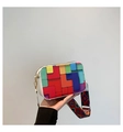 Detail of colorful geometric block crossbody bag with ethnic patterned wide strap - White