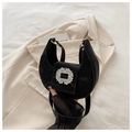 Chic black crescent shoulder bag with a sparkling silver rhinestone buckle accessory - Black