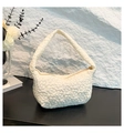 Creamy white quilted shoulder bag with 3D floral embroidery and gold zipper detail - White