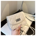 Quilted white crossbody bag with silver chain strap and metal turn-lock closure - White