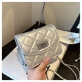 Silver quilted crossbody chain bag with metallic finish and metal turn-lock closure - Silver