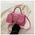 Pink lychee grain leather crossbody bag with gold buckle and matching coin purse - Pink