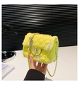 Detail of yellow quilted tweed shoulder bag with colorful stripes and gold chain strap - Yellow