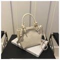 Cream bucket bag in lychee texture with knot handle and adjustable shoulder strap - Off-white without Pendant