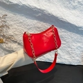 Modern red faux leather baguette bag with gold chain and matching shoulder strap - Red