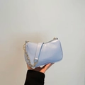 Light blue PU leather tote bag with a decorative gold chain and slim shoulder strap - Blue