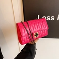 Bright pink quilted leather crossbody bag with golden flower clasp and chain strap - Rose Pink