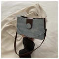 Detail of light blue denim crossbody bag with silver chain and white glitter sparkles - Light Blue