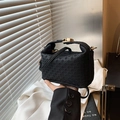 Chic black woven handbag with gold hardware, elegant handheld style for summer - Black