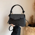 Deep grey star print crossbody bag with herringbone texture and black leather handles - Star