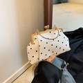 Vintage polka dot handbag with gold frame handle and chain strap for street fashion - White
