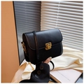 Elegant black faux leather crossbody flap bag with a golden square lock and strap - Black
