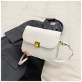 Elegant white crossbody bag with vintage golden lock and smooth faux leather finish - White