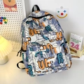 Mochila de graffiti cartoon con patrones geométricos naranja y azul y texto FASHION - Púrpura