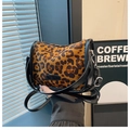 Detail of leopard print shoulder bag with black leather trim and Fashion logo badge - Brown Leopard