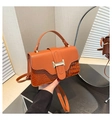 Detail of two-tone square bag with caramel leather and dark brown crocodile texture - Brown