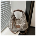 Detail view of woven brown and white plaid tote bag with leather straps and logo patch - No Pendant / Coffee