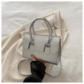 Minimalist silver metallic tote bag with sleek top handles and detachable crossbody strap - Silver