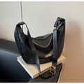 Minimalist black leather crescent hobo bag with adjustable strap and silver hardware - Black
