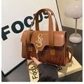 Brown crocodile embossed leather handbag with gold S-buckle and tassel detail - Brown