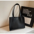 Minimalist black matte leather tote bag with vertical stitching and fashion label detail - Black