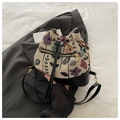 Secchiello jacquard a fiori beige e nero con coulisse e dettagli in oro metallizzato - Nero