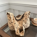 Borsa tote in velluto a coste con stampa fiocco e cerniera nera color crema - Cachi