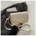 Quilted cream crossbody bag with gold chain strap and elegant faux leather texture - White