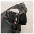 Minimalist black faux leather underarm bag with gold metal buckle and sleek design - Black
