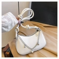 White crescent-shaped shoulder bag featuring pearl chain details and star charms - White