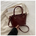 Chic burgundy tote bag in glossy leather finish with adjustable shoulder strap - Red Without Charm