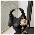 Detail of black pleated crescent bag with fashion label and cute camel plush charm - With Pendant / Black