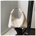 Detail of a beige suede hobo bag with a fashion logo patch and silver metal snap closure - No Pendant / Off White
