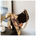 Detail of black crescent hobo bag with gold chain and patterned silk scarf handle - Black